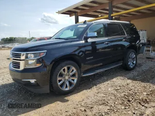 2015 Chevrolet Tahoe LTZ with VIN 1GNSKCKC2FR704921, listed as a Copart auction lot 61249465 with 167,589 mi miles and Salvage title. Bid and sale history available at DreamBid. Image 1.