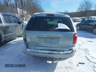 2003 Chrysler Town & Country LX with VIN 2C4GP44L43R224016, listed as a IAAI auction lot 41370108 with 122,418 mi miles and . Bid and sale history available at DreamBid. Image 16.