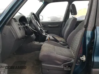 1999 Toyota RAV4 with VIN JT3GP10V6X0036057, listed as a Copart auction lot 49011295 with 183,287 mi miles and Clean title. Bid and sale history available at DreamBid. Image 7.
