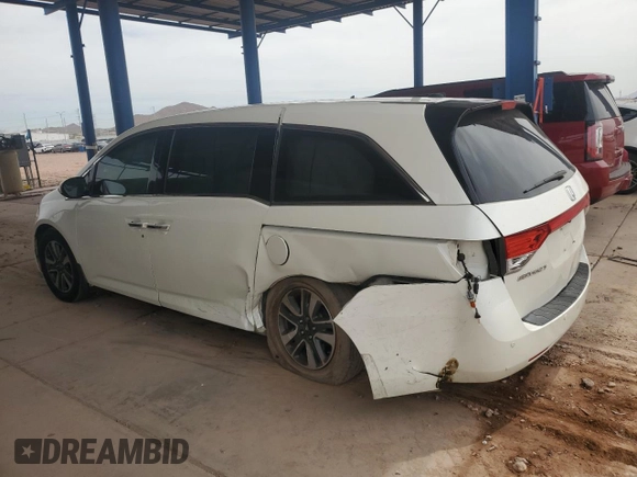 2017 Honda Odyssey Touring with VIN 5FNRL5H94HB007979, listed as a Copart auction lot 56755435 with 125,821 mi miles and Salvage title. Bid and sale history available at DreamBid. Image 2.