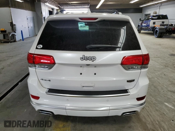 2018 Jeep Grand Cherokee Summit with VIN 1C4RJFJT5JC273869, listed as a Copart auction lot 57482865 with 70,843 mi miles and Salvage title. Bid and sale history available at DreamBid. Image 6.