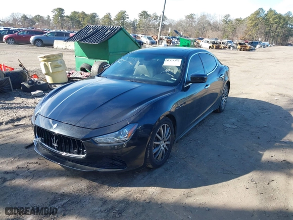 2014 Maserati Ghibli S Q4 with VIN ZAM57RTA1E1091738, listed as a IAAI auction lot 41518359 with 75,641 mi miles. Bid and sale history available at carsss.com. Image 17.