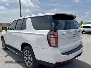 2021 Chevrolet Tahoe LT with VIN 1GNSCNKD4MR252131, listed as a Copart auction lot 66889235 with 102,048 mi miles and Clean title. Bid and sale history available at DreamBid. Image 3.
