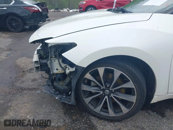 2016 Nissan Maxima SV z VIN 1N4AA6AP2GC401273, wystawiony jako IAAI lot #41898456 z przebiegiem 139 720 mil mil oraz . Historia ofert i sprzedaży dostępna na DreamBid. Obrazek 18.