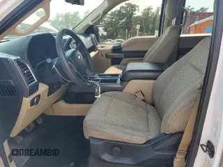 2016 Ford F-150 XLT with VIN 1FTEW1EF8GKF41125, listed as a Copart auction lot 65579435 with 138,498 mi miles and Salvage title. Bid and sale history available at DreamBid. Image 7.