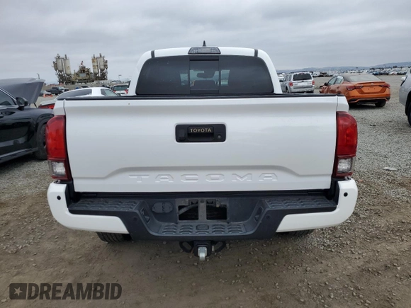 2018 Toyota Tacoma SR z VIN 3TMCZ5AN5JM181489, wystawiony jako Copart lot #55696365 z przebiegiem 70 091 mil mil oraz Szkoda całkowita • Salvage title. Historia ofert i sprzedaży dostępna na DreamBid. Obrazek 6.