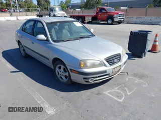 2004 Hyundai Elantra GLS z VIN KMHDN46D64U796686, wystawiony jako IAAI lot #42306228 z przebiegiem Nie podano mil oraz . Historia ofert i sprzedaży dostępna na DreamBid. Obrazek 1.