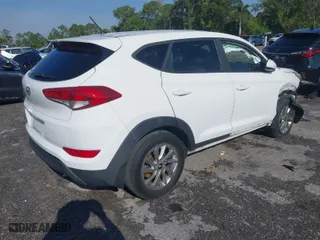 2018 Hyundai Tucson SE with VIN KM8J23A42JU627533, listed as a IAAI auction lot 41880112 with 61,840 mi miles. Bid and sale history available at carsss.com. Image 4.