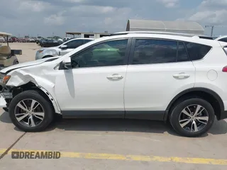 2018 Toyota RAV4 XLE с VIN JTMWFREV3JD121908, выставлен на аукционе IAAI как лот 42140675 с пробегом 114 819 миль миль и . История ставок и продаж доступна на DreamBid. Изображение 14.