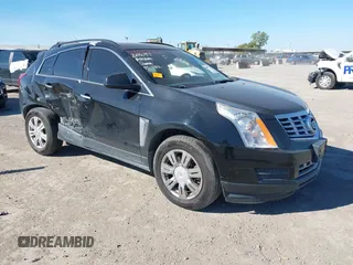2015 Cadillac SRX with VIN 3GYFNAE30FS573125, listed as a IAAI auction lot 40972187 with 122,612 mi miles and . Bid and sale history available at carsss.com. Image 1.