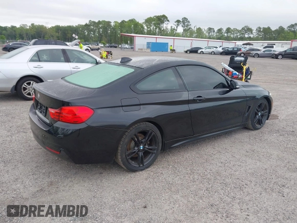 2015 BMW 4 Series 428i with VIN WBA3N3C55FK232319, listed as a IAAI auction lot 42136421 with 140,300 mi miles and . Bid and sale history available at DreamBid. Image 4.