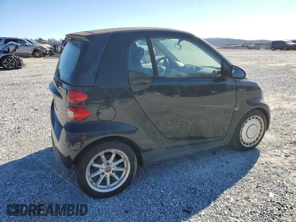 2013 Smart fortwo Pure z VIN WMEEJ3BA1DK666323, wystawiony jako Copart lot #87106934 z przebiegiem 92 313 mil mil oraz Tytuł czysty. Historia ofert i sprzedaży dostępna na DreamBid. Obrazek 3.