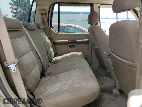 2005 Ford Explorer Sport Trac XLS with VIN 1FMZU67K05UA59602, listed as a Copart auction lot 56756175 with 136,440 mi miles and Salvage title. Bid and sale history available at DreamBid. Image 10.