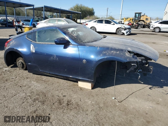 2014 Nissan 370Z Touring with VIN JN1AZ4EH6EM633394, listed as a Copart auction lot 74360354 with 0 mi miles and Salvage Title. Bid and sale history available at carsss.com. Image 4.