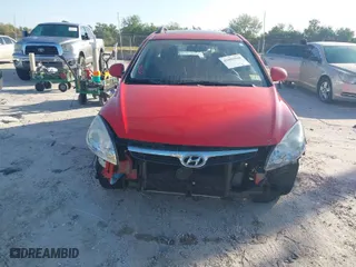 2010 Hyundai Elantra Touring SE with VIN KMHDC8AE8AU070112, listed as a IAAI auction lot 41803426 with 117,816 mi miles. Bid and sale history available at carsss.com. Image 13.