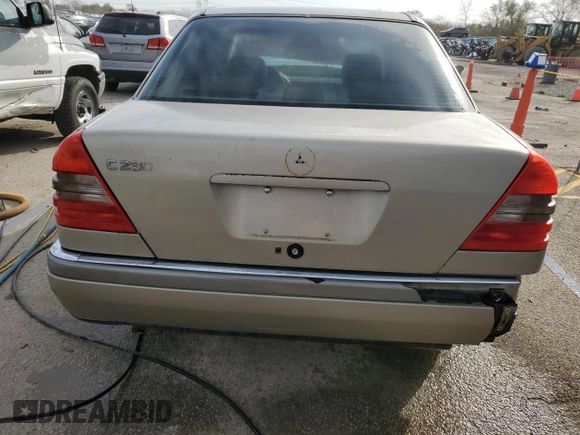 1997 Mercedes-Benz C z VIN WDBHA23EXVF601373, wystawiony jako Copart lot #78402194 z przebiegiem 187 821 mil mil oraz Szkoda całkowita • Salvage title. Historia ofert i sprzedaży dostępna na DreamBid. Obrazek 6.