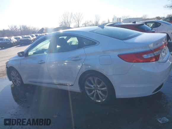 2014 Hyundai Azera with VIN KMHFG4JG6EA354949, listed as a IAAI auction lot 41034372 with 173,338 mi miles and . Bid and sale history available at DreamBid. Image 14.
