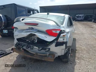 2015 Ford Focus Titanium with VIN 1FADP3J27FL347983, listed as a IAAI auction lot 42634821 with 156,216 mi miles and . Bid and sale history available at DreamBid. Image 4.