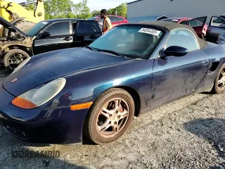 2000 Porsche Boxster с VIN WP0CA2989YU627749, выставлен на аукционе Copart как лот 54054305 с пробегом 189 173 миль миль и Списание • Salvage title. История ставок и продаж доступна на DreamBid. Изображение 13.