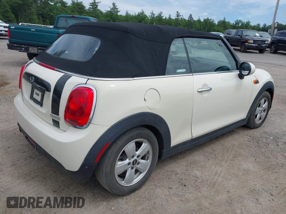 2019 MINI Convertible Cooper z VIN WMWWG5C52K3F79780, wystawiony jako IAAI lot #42622429 z przebiegiem 38 532 mil mil oraz . Historia ofert i sprzedaży dostępna na DreamBid. Obrazek 4.