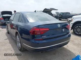 2018 Volkswagen Passat S z VIN 1VWAA7A35JC040106, wystawiony jako IAAI lot #41921626 z przebiegiem 60 785 mil mil oraz . Historia ofert i sprzedaży dostępna na DreamBid. Obrazek 3.