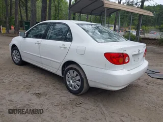 2003 Toyota Corolla CE with VIN JTDBR32EX30046514, listed as a IAAI auction lot 42013470 with 209,504 mi miles and . Bid and sale history available at DreamBid. Image 3.