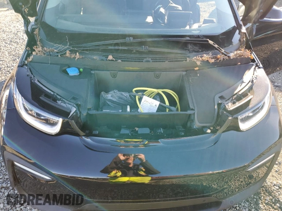 2020 BMW i3 z VIN WBY8P4C08L7G07617, wystawiony jako Copart lot #42570015 z przebiegiem 2 470 mil mil oraz Szkoda całkowita • Salvage title. Historia ofert i sprzedaży dostępna na DreamBid. Obrazek 12.