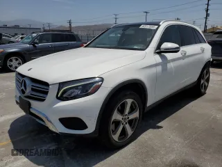 2019 Mercedes-Benz GLC 300 with VIN WDC0G4JB5KF614670, listed as a Copart auction lot 62017055 with 56,575 mi miles and Salvage title. Bid and sale history available at DreamBid. Image 1.