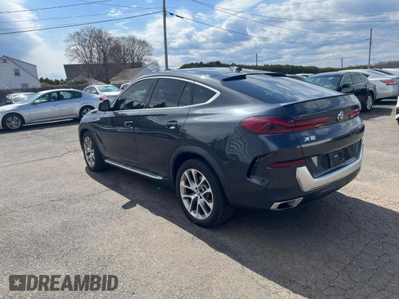 2021 BMW X6 xDrive40i z VIN 5UXCY6C02M9D88338, wystawiony jako Copart lot #50947775 z przebiegiem 116 477 mil mil oraz Czysty tytuł • Clean title. Historia ofert i sprzedaży dostępna na DreamBid. Obrazek 2.