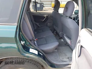 2003 Toyota RAV4 z VIN JTEGH20V530095363, wystawiony jako IAAI lot #42356921 z przebiegiem 92 495 mil mil oraz . Historia ofert i sprzedaży dostępna na DreamBid. Obrazek 8.