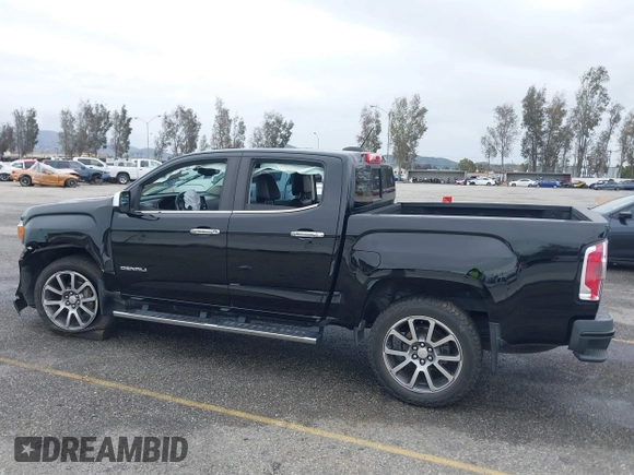 2018 GMC Canyon 4WD Denali with VIN 1GTG6EEN7J1318059, listed as a IAAI auction lot 41772860 with 80,230 mi miles. Bid and sale history available at carsss.com. Image 14.