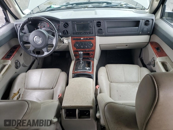 2006 Jeep Commander Limited z VIN 1J8HG58236C299193, wystawiony jako Copart lot #55725905 z przebiegiem 171 946 mil mil oraz Szkoda całkowita • Salvage title. Historia ofert i sprzedaży dostępna na DreamBid. Obrazek 8.