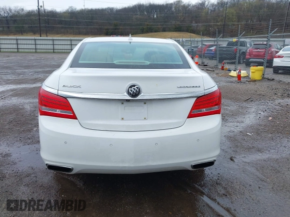 2014 Buick LaCrosse Premium II with VIN 1G4GF5G39EF305460, listed as a IAAI auction lot 41951229 with 127,188 mi miles and . Bid and sale history available at DreamBid. Image 16.