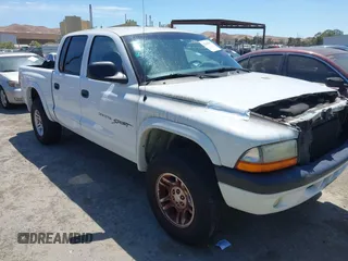 2001 Dodge Dakota Sport with VIN 1B7HG2ANX1S296588, listed as a IAAI auction lot 42849342 with Not provided miles and . Bid and sale history available at DreamBid. Image 1.