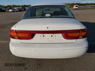 2001 Saturn SL z VIN 1G8ZK52771Z219294, wystawiony jako Copart lot #83155494 z przebiegiem 190 338 mil mil oraz Szkody całkowita. Historia ofert i sprzedaży dostępna na DreamBid. Obrazek 6.