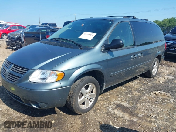 2005 Dodge Caravan SXT z VIN 2D4GP44LX5R581304, wystawiony jako IAAI lot #42709024 z przebiegiem 79 073 mil mil oraz . Historia ofert i sprzedaży dostępna na DreamBid. Obrazek 2.