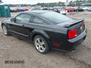 2006 Ford Mustang GT Deluxe with VIN 1ZVHT82H965112395, listed as a IAAI auction lot 41895837 with 89,804 mi miles and . Bid and sale history available at carsss.com. Image 3.