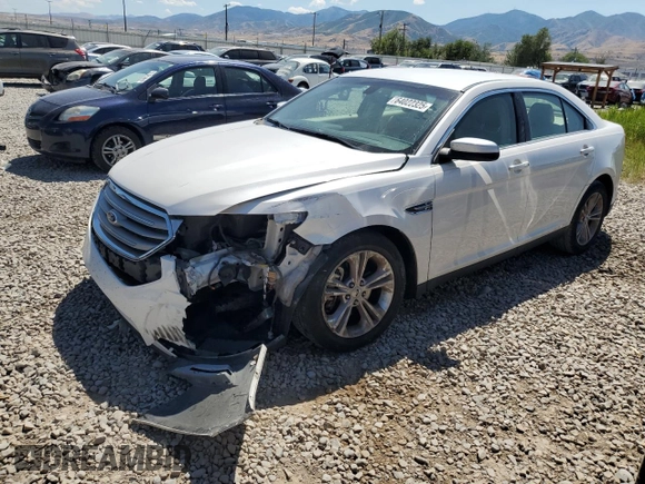 2015 Ford Taurus SEL z VIN 1FAHP2E8XFG181929, wystawiony jako Copart lot #64022325 z przebiegiem 106 272 mil mil oraz Szkoda całkowita • Salvage title. Historia ofert i sprzedaży dostępna na DreamBid. Obrazek 1.