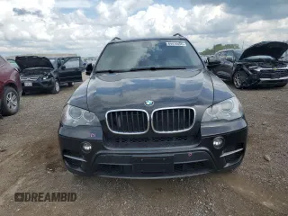2012 BMW X5 50i with VIN 5UXZV8C51CL424965, listed as a Copart auction lot 64414455 with 121,894 mi miles and Clean title. Bid and sale history available at DreamBid. Image 5.