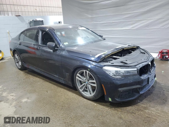 2019 BMW 7 Series 740i xDrive with VIN WBA7E4C58KGV70026, listed as a Copart auction lot 59465615 with Not provided miles and Salvage title. Bid and sale history available at DreamBid. Image 4.