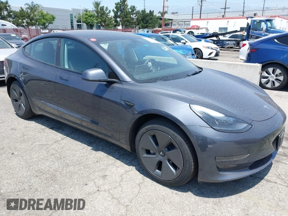 2023 Tesla Model 3 with VIN 5YJ3E1EA4PF400306, listed as a IAAI auction lot 42398603 with 18,551 mi miles and . Bid and sale history available at DreamBid. Image 1.