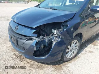 2015 Mazda 5 Sport z VIN JM1CW2BL9F0187973, wystawiony jako IAAI lot #42378711 z przebiegiem 97 543 mil mil oraz . Historia ofert i sprzedaży dostępna na DreamBid. Obrazek 6.