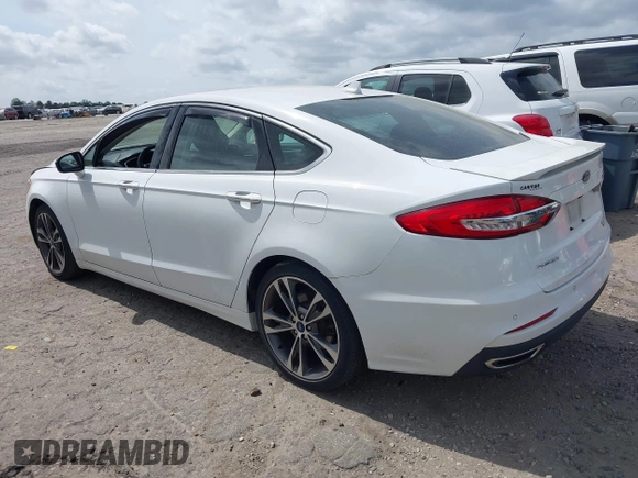 2019 Ford Fusion Titanium with VIN 3FA6P0D91KR140260, listed as a IAAI auction lot 41931629 with 95,207 mi miles. Bid and sale history available at carsss.com. Image 3.