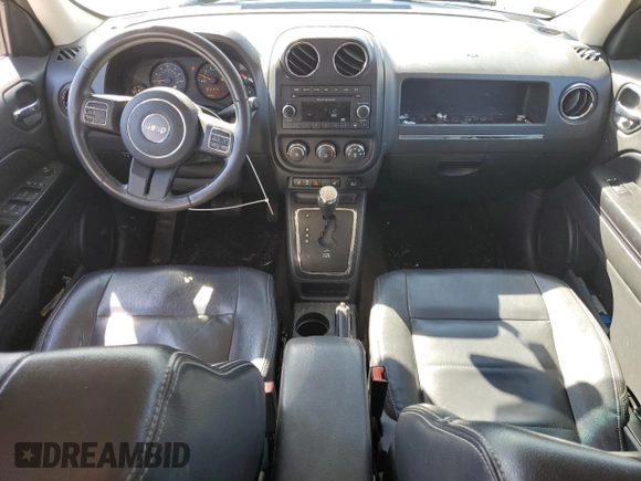 2014 Jeep Patriot Latitude with VIN 1C4NJPFA9ED758298, listed as a Copart auction lot 47253425 with 139,322 mi miles and Salvage title. Bid and sale history available at DreamBid. Image 8.