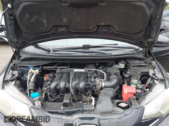 2015 Honda Fit EX-L with VIN 3HGGK5H88FM726406, listed as a IAAI auction lot 42033501 with 124,216 mi miles. Bid and sale history available at carsss.com. Image 10.