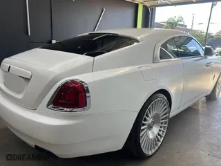 2015 Rolls-Royce Wraith with VIN SCA665C52FUX85482, listed as a Copart auction lot 77887554 with 99,781 mi miles and Salvage Title. Bid and sale history available at carsss.com. Image 4.