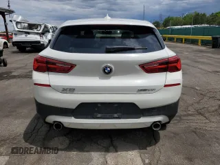 2018 BMW X2 xDrive28i z VIN WBXYJ5C38JEF79686, wystawiony jako Copart lot #56988735 z przebiegiem 103 799 mil mil oraz Szkoda całkowita • Salvage title. Historia ofert i sprzedaży dostępna na DreamBid. Obrazek 6.