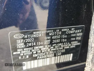 2023 Genesis G70 3.3T with VIN KMTG54TE7PU113169, listed as a Copart auction lot 71008994 with 17,864 mi miles and Salvage Title. Bid and sale history available at DreamBid. Image 13.