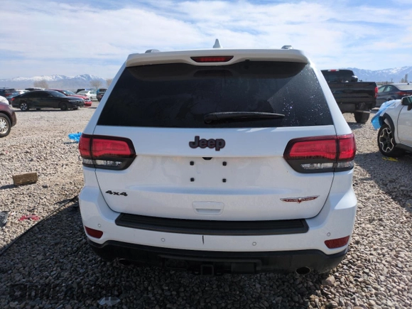 2021 Jeep Grand Cherokee Trailhawk with VIN 1C4RJFLG4MC703945, listed as a Copart auction lot 50703085 with 57,109 mi miles and Salvage Title. Bid and sale history available at carsss.com. Image 6.