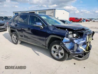 2022 Toyota RAV4 Hybrid XLE with VIN 2T3RWRFV0NW138427, listed as a Copart auction lot 60860815 with 27,772 mi miles and Salvage title. Bid and sale history available at DreamBid. Image 4.